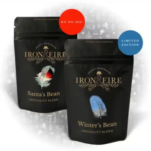 image showing 2 black coffee bags with Christmas decorations