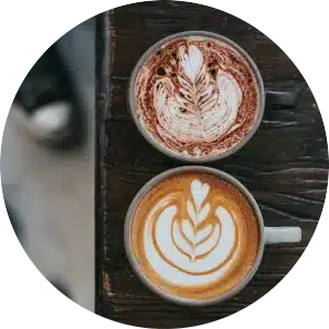 Circular image to showcase the differences between lattes and cappuccinos.