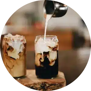 Circular image of a variation of a latte.